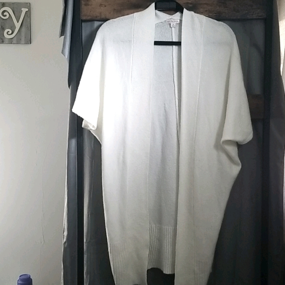 Knee length cream cardigan.  Short sleeve